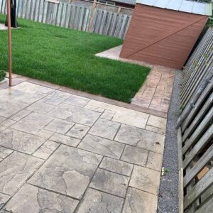 Finished backyard landscape with new grass.