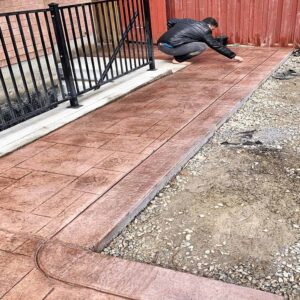 Custom stamped concrete patio installation without borders in GTA.